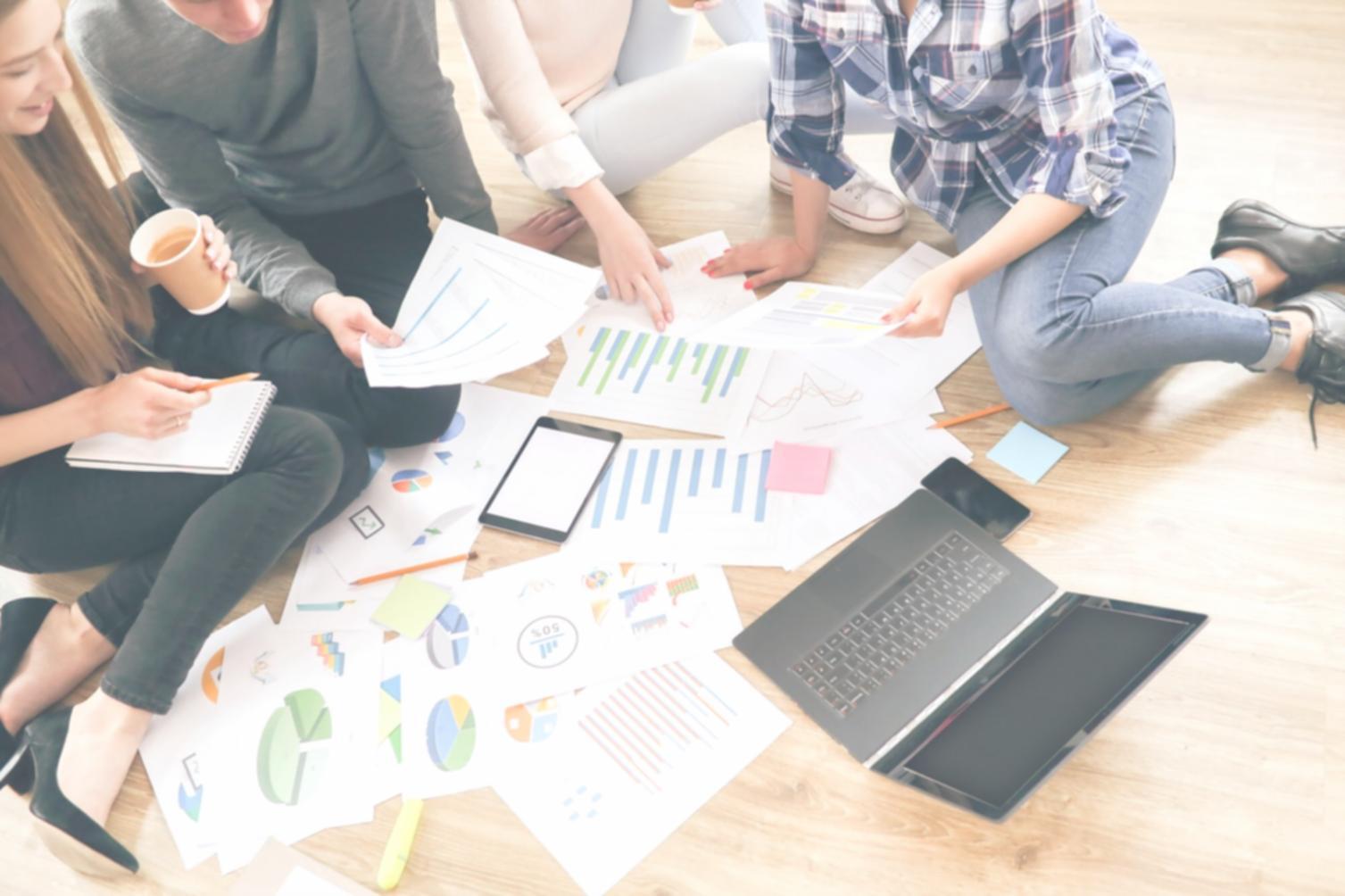 Professional analyzing financial charts and investment data on computer